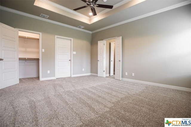1018 Winchester Dr, Nolanville, TX 76559 - unfurnished bedroom with a tray ceiling, crown molding, carpet, and baseboards