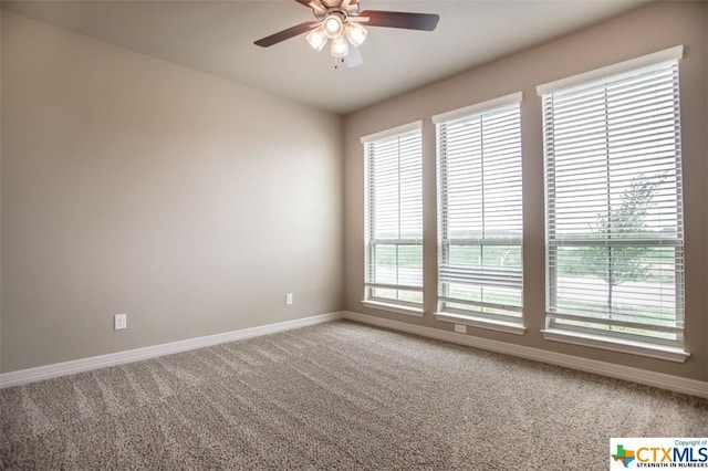 1018 Winchester Dr, Nolanville, TX 76559 - spare room with baseboards, light carpet, and a ceiling fan