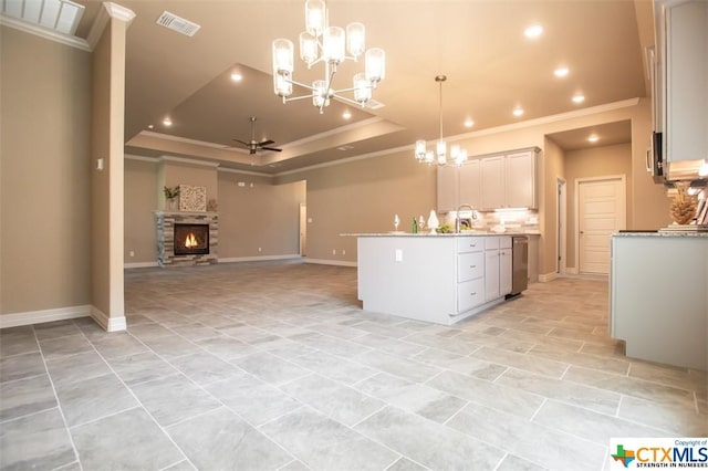 1018 Winchester Dr, Nolanville, TX 76559 - kitchen with crown molding, a chandelier, recessed lighting, light countertops, and open floor plan