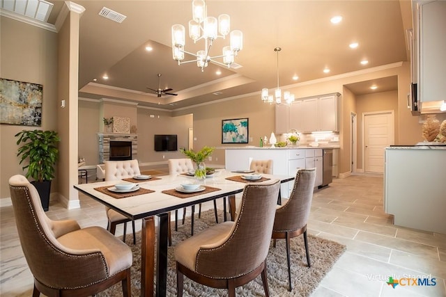 1018 Winchester Dr, Nolanville, TX 76559 - dining area featuring ornamental molding, a chandelier, recessed lighting, a raised ceiling, and baseboards