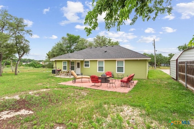 3299 Lake Park Rd, Belton, TX 76513 - rear view of house featuring a lawn and a patio area