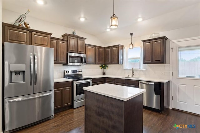 3299 Lake Park Rd, Belton, TX 76513 - kitchen with dark brown cabinets, appliances with stainless steel finishes, plenty of natural light, and a sink