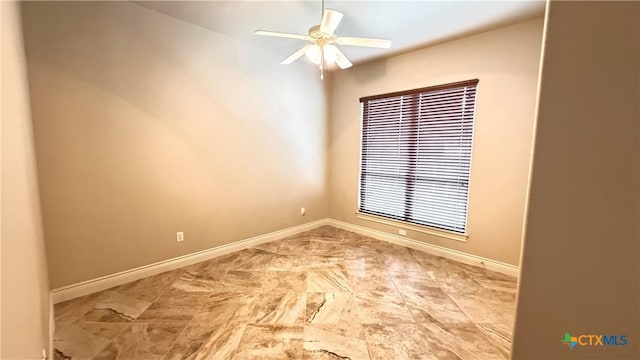 empty room featuring ceiling fan