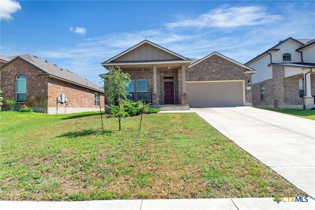 224 Bainbridge Dr, Temple, TX 76502 - view of front of house with brick siding, an attached garage, concrete driveway, a front yard, and a porch