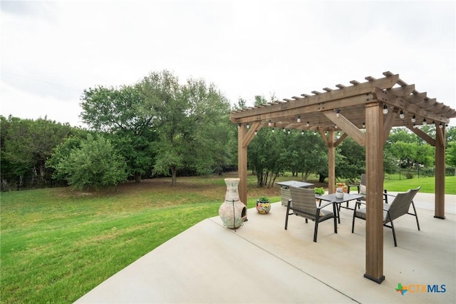 view of patio with a pergola and outdoor dining area