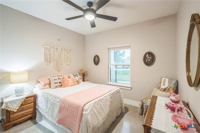 bedroom featuring baseboards, carpet flooring, and a ceiling fan