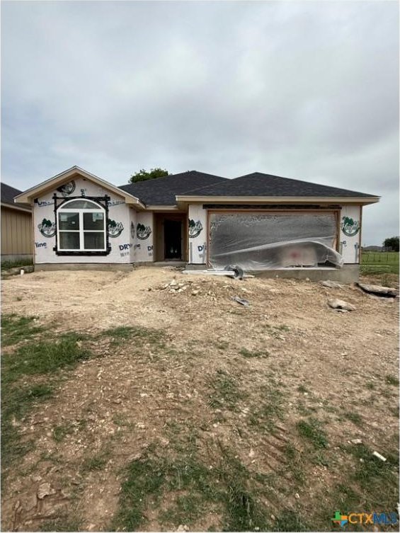 2119 Blackhawk Loop, Belton, TX 76513 - unfinished property featuring driveway and an attached garage