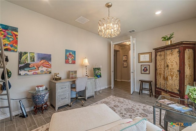 home office with baseboards, wood finish floors, a chandelier, and recessed lighting
