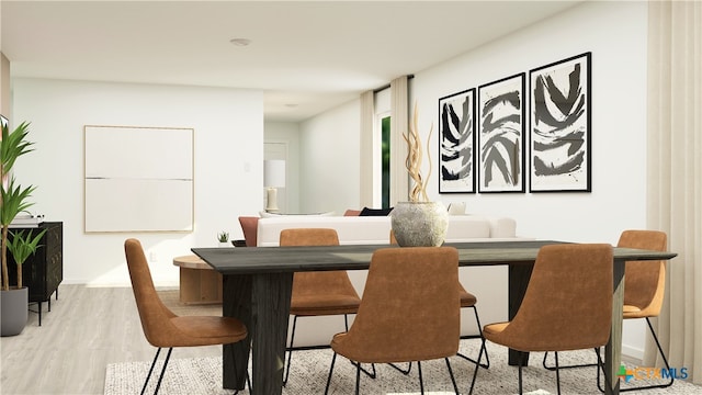 dining space with light wood-type flooring