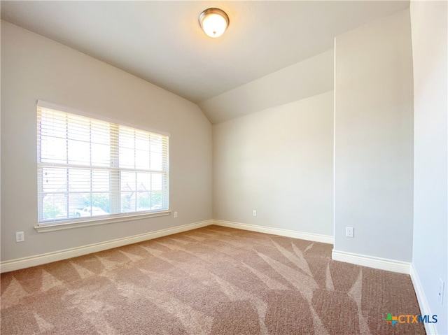 414 Field Corn Ln, San Marcos, TX 78666 - empty room featuring carpet and lofted ceiling