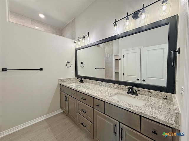 bathroom featuring vanity and hardwood / wood-style floors