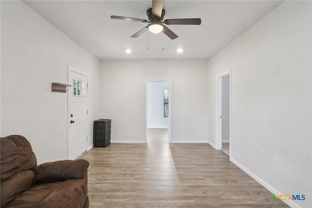 608 E 13th Ave, Belton, TX 76513 - living area with a ceiling fan, light wood-style flooring, and recessed lighting