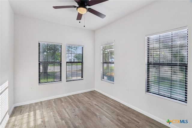 608 E 13th Ave, Belton, TX 76513 - spare room with wood finished floors and ceiling fan