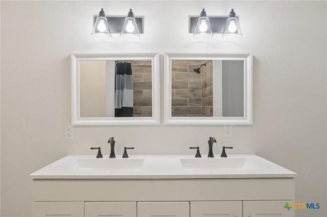 608 E 13th Ave, Belton, TX 76513 - full bath featuring double vanity and a shower with curtain