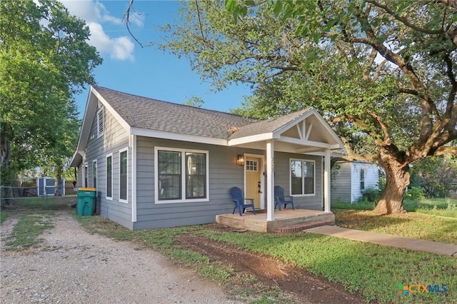 608 E 13th Ave, Belton, TX 76513 - bungalow with a porch and roof with shingles