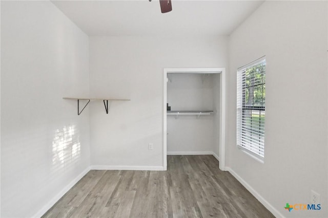 608 E 13th Ave, Belton, TX 76513 - walk in closet featuring wood finished floors and a ceiling fan