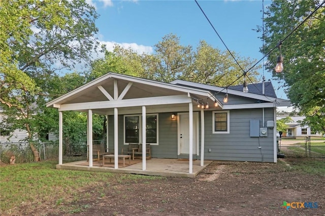 608 E 13th Ave, Belton, TX 76513 - rear view of house with covered porch