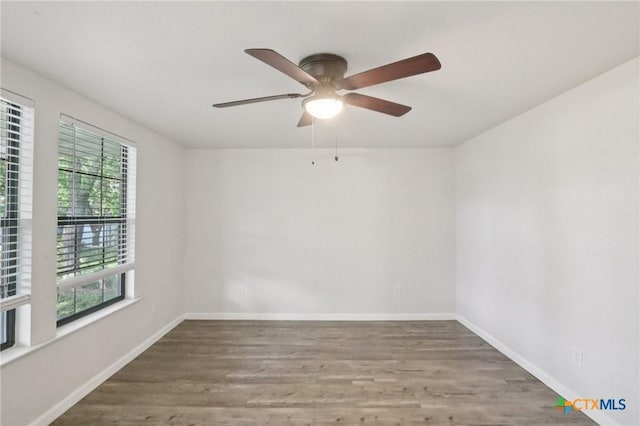 608 E 13th Ave, Belton, TX 76513 - empty room featuring wood finished floors and ceiling fan