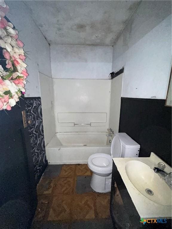 full bath with toilet and vanity