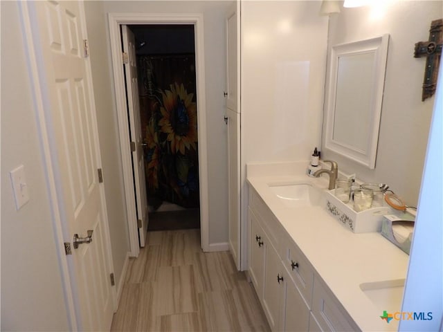 930 Redwood, Rockport, TX 78382 - bathroom featuring double vanity