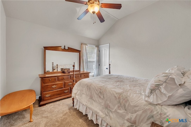 carpeted bedroom featuring ceiling fan and lofted ceiling