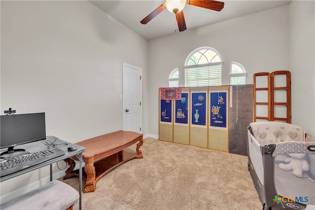 office space featuring ceiling fan and carpet floors