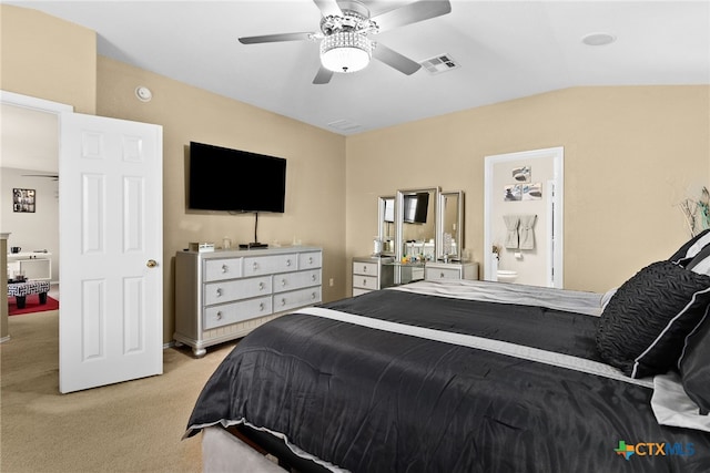 bedroom with ceiling fan, light colored carpet, and lofted ceiling