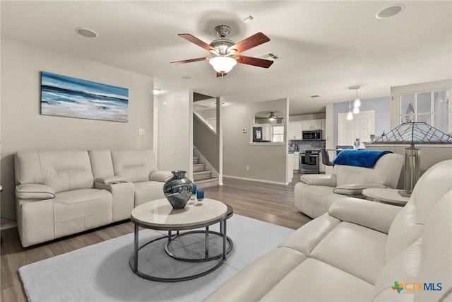 living room with wood-type flooring