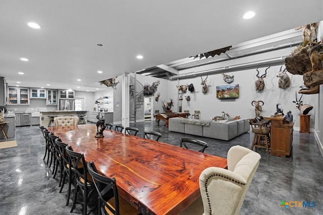 dining space featuring pool table and sink