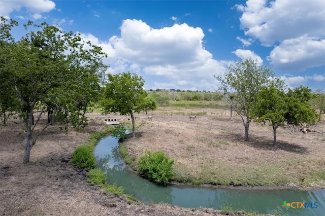 view of yard with a water view