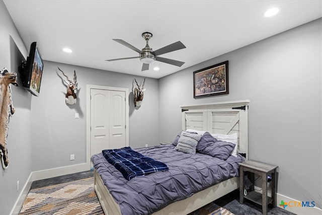 bedroom featuring a closet and ceiling fan