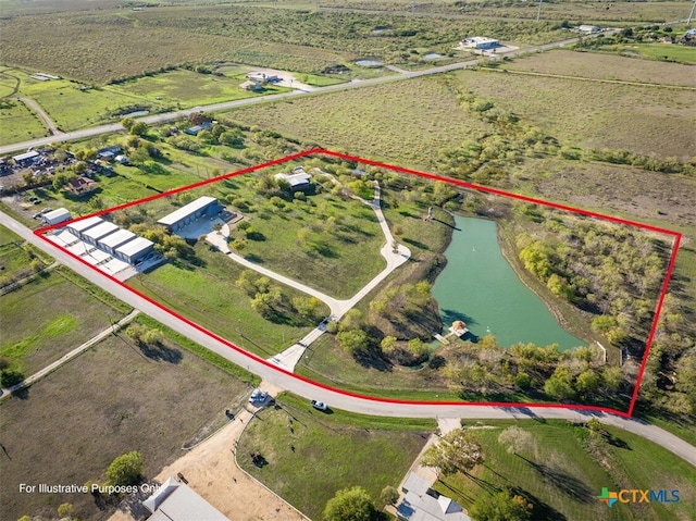 bird's eye view with a water view and a rural view