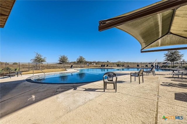 view of pool with a patio area