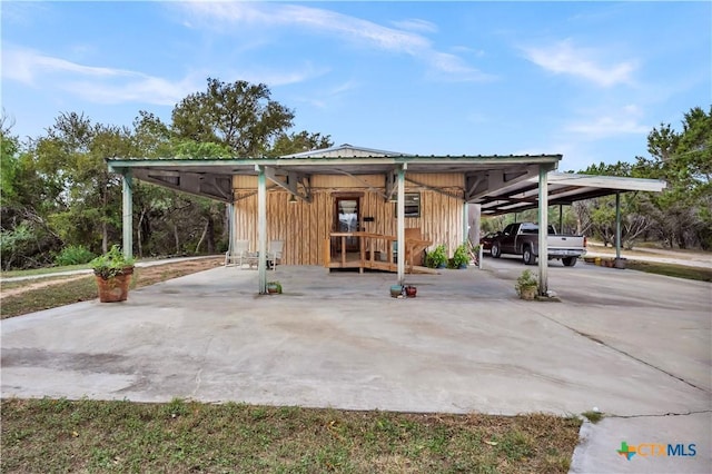 view of patio featuring a carport