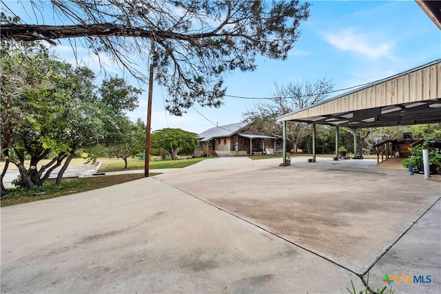 view of yard featuring a carport