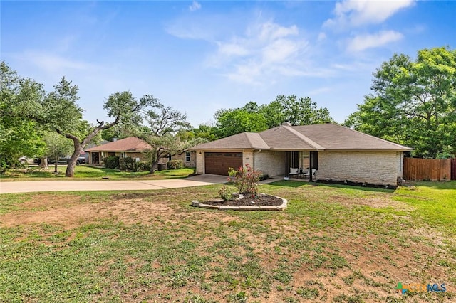 404 Innwood Dr, Georgetown, TX 78628 - ranch-style house with driveway and an attached garage