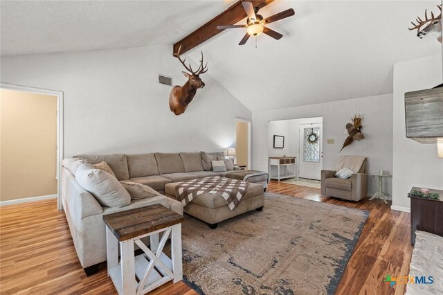 404 Innwood Dr, Georgetown, TX 78628 - living area with a ceiling fan, wood finished floors, and baseboards