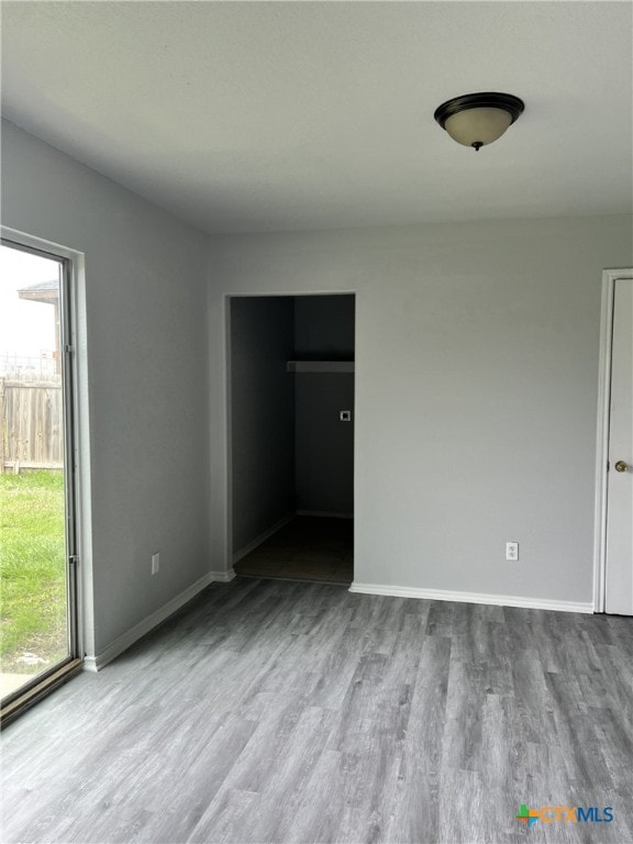 8619 Key N Way, Converse, TX 78109 - spare room with plenty of natural light, wood finished floors, and baseboards