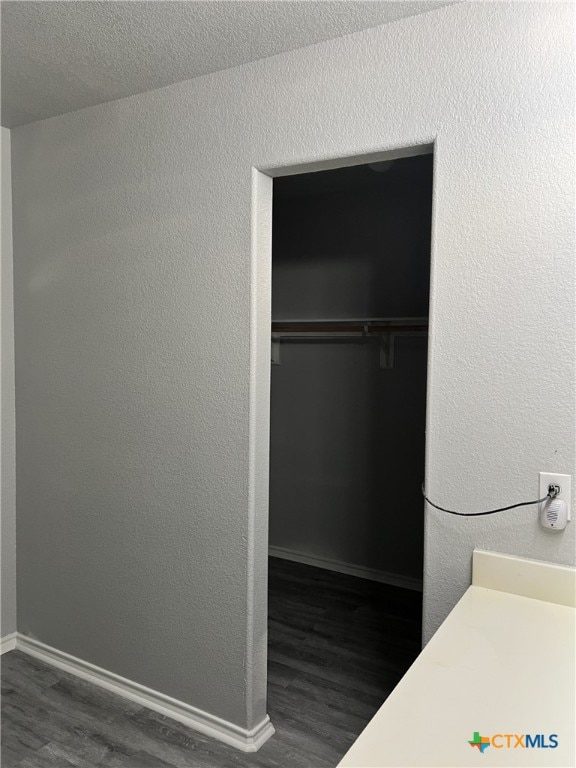 8619 Key N Way, Converse, TX 78109 - laundry room with wood finished floors and baseboards