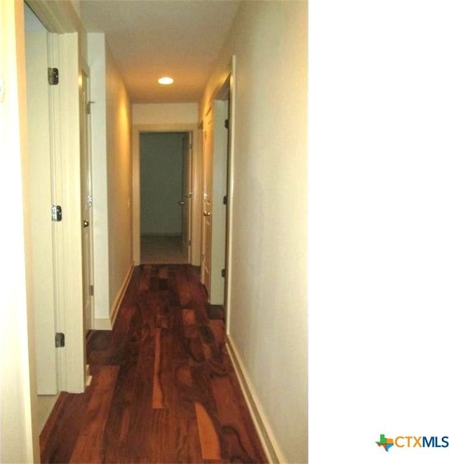 hall featuring dark hardwood / wood-style floors