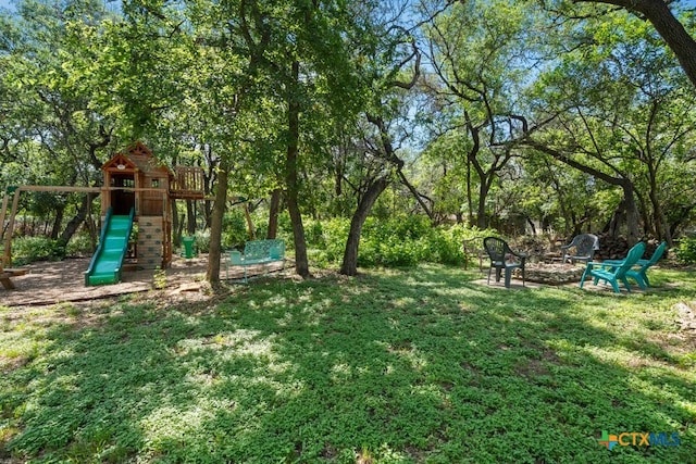 view of yard with a playground