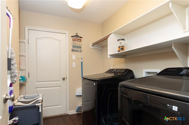 319 Silverado Trl, Victoria, TX 77901 - laundry area with laundry area, dark wood finished floors, and washer and clothes dryer