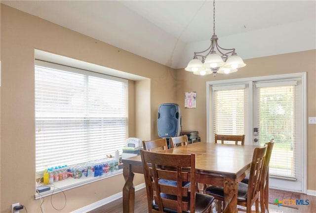 319 Silverado Trl, Victoria, TX 77901 - dining space featuring a wealth of natural light, an inviting chandelier, baseboards, and lofted ceiling