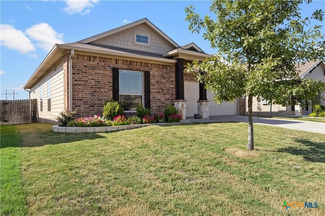 2206 Hayes St, Temple, TX 76502 - view of front of property featuring driveway, a garage, and brick siding