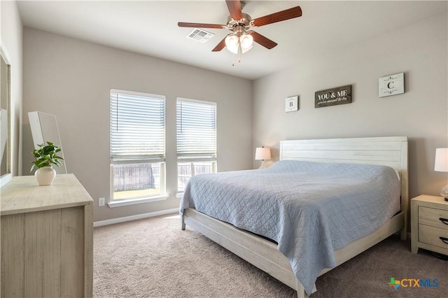 2206 Hayes St, Temple, TX 76502 - carpeted bedroom with multiple windows, ceiling fan, and baseboards
