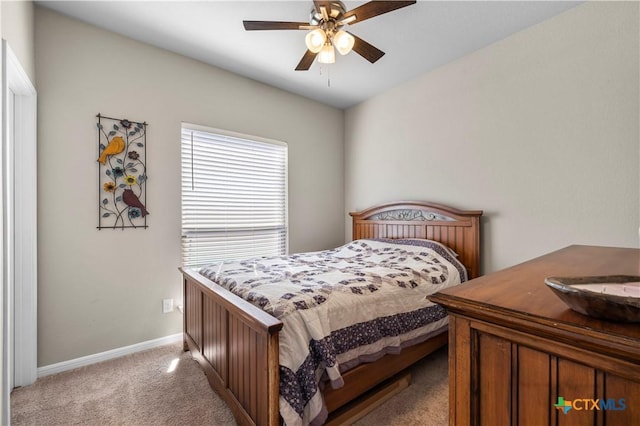 2206 Hayes St, Temple, TX 76502 - bedroom featuring light colored carpet, baseboards, and a ceiling fan