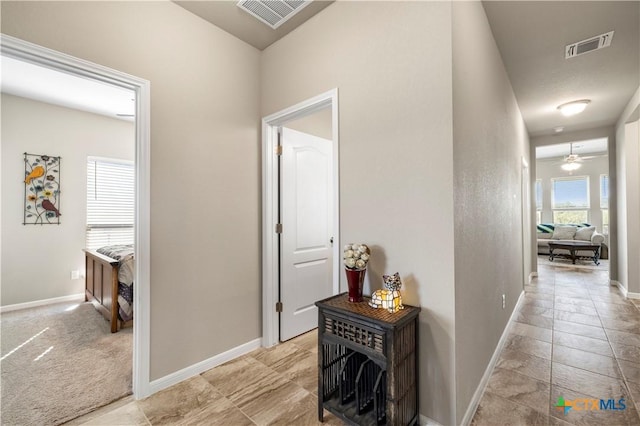 2206 Hayes St, Temple, TX 76502 - hallway featuring baseboards