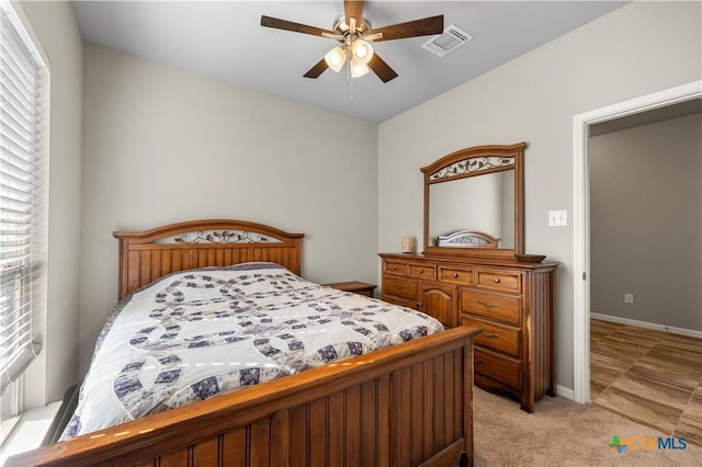 2206 Hayes St, Temple, TX 76502 - bedroom with light carpet and ceiling fan