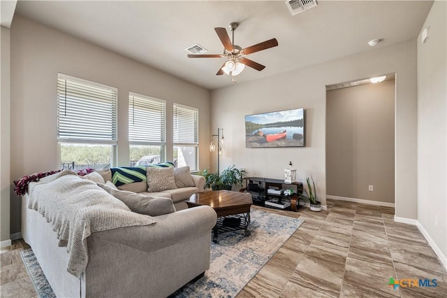 2206 Hayes St, Temple, TX 76502 - living room with a ceiling fan and baseboards