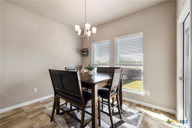 2206 Hayes St, Temple, TX 76502 - dining area featuring plenty of natural light, baseboards, and a chandelier